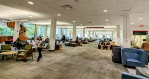 Carleton University MacOdrum Library study area with upgraded ceiling lighting and open seating spaces.
