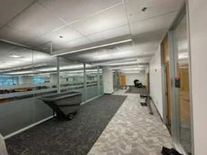 Carleton University MacOdrum Library archives renovation with new suspended LED lighting and updated study area finishes.