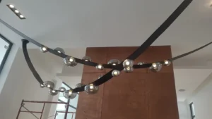 Modern decorative ceiling light fixture in Rockcliffe custom home