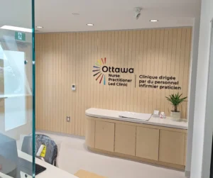 Ottawa Nurse Practitioner-Led Clinic reception with LED lighting, ceiling devices, and finished electrical upgrades.
