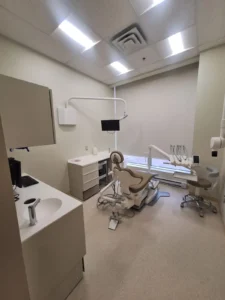 Dental & Plastic Surgery Facility dental operatory with ceiling LED lights, dental chair, equipment power, and finished medical fit up.