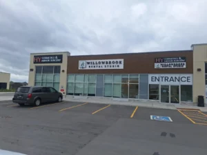 Dental & Plastic Surgery Facility exterior at 1515 Earl Armstrong Road showing Willowbrook Dental Studio and HY Cosmetics & Minor Surgery signage.