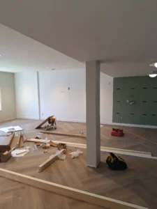 Windsor Park renovation common area at Old Faulks Home with recessed lighting and electrical rough ins during construction.