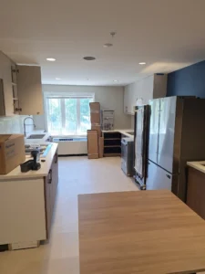 Windsor Park renovation kitchen at Old Faulks Home with recessed lighting and electrical connections for new appliances.